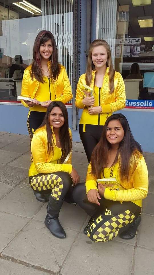 Promo Nation SA promoters in branded yellow kit handing out flyers outside a retail store
