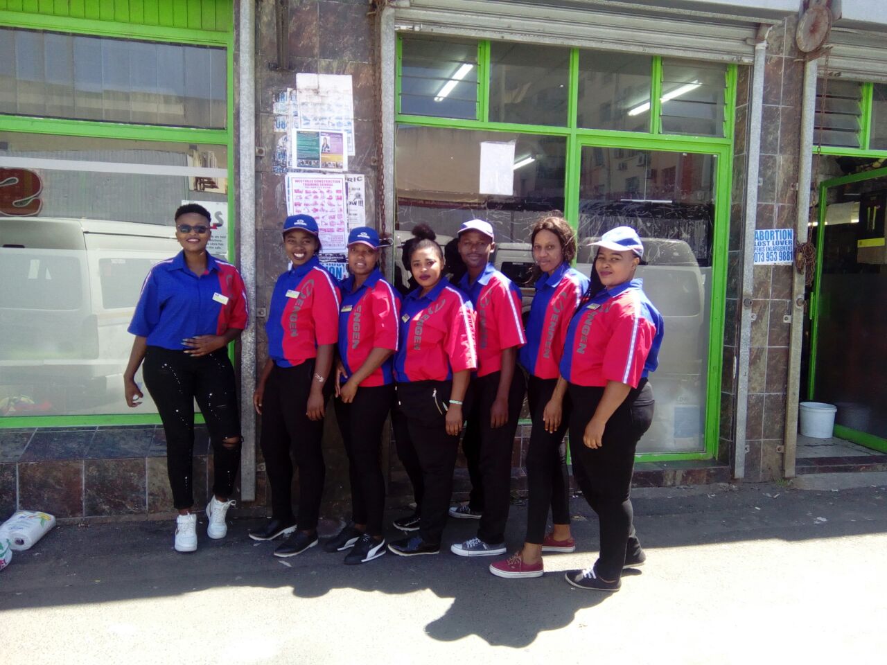 Engen-branded field team outside a store during a street activation